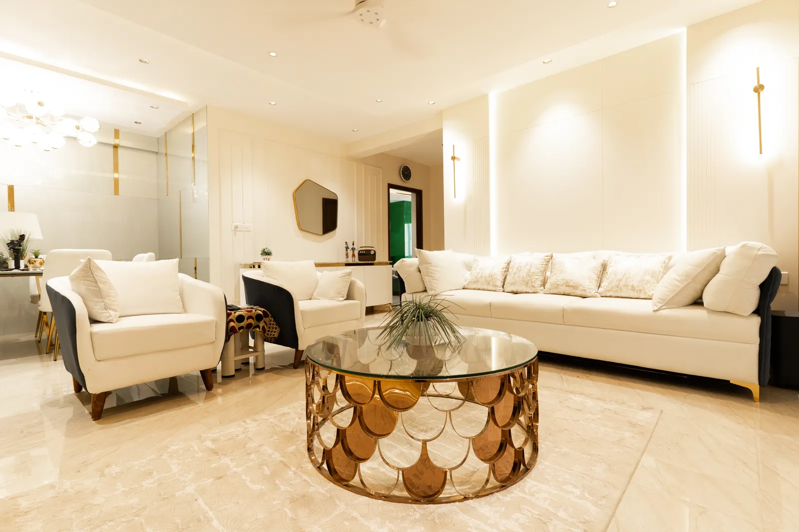 Living room with white sofas and copper scale-pattern coffee table — Arna's Home